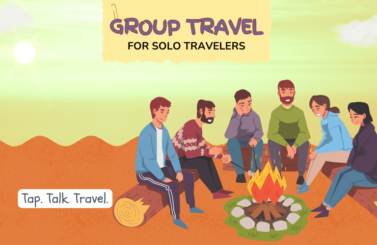 Campfire scene in desert mountains showing group travel for solo travelers