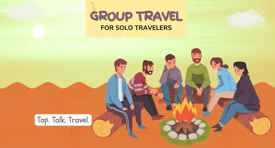 Campfire scene in desert mountains showing group travel for solo travelers