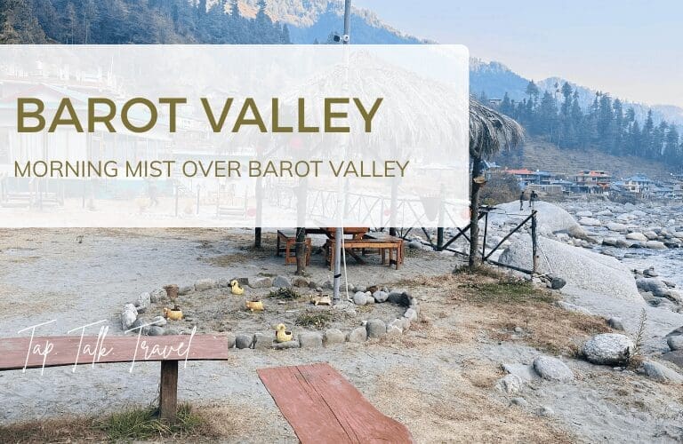 Peaceful morning view over Barot Valley with river and pine-covered hills for Barot Valley solo travelers